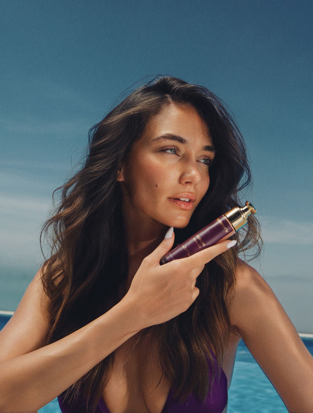 AURUM SHIMMER - Negujući zlatno-bronzani serum za telo i lice